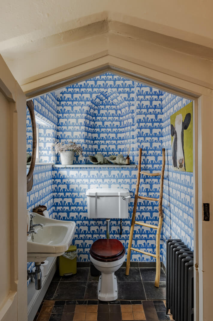 A Charming Gothic-Style Home with Original Details 15 ue wallpaper in powder room nordroom A Charming Gothic-Style Home with Original Details