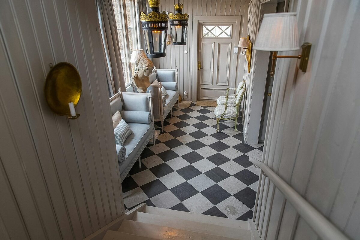 view into hall with checkerboard floor luxurious summer house sweden nordroom