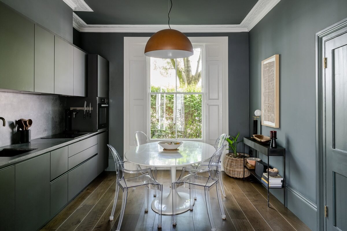 kitchen with gray walls and cabinets
