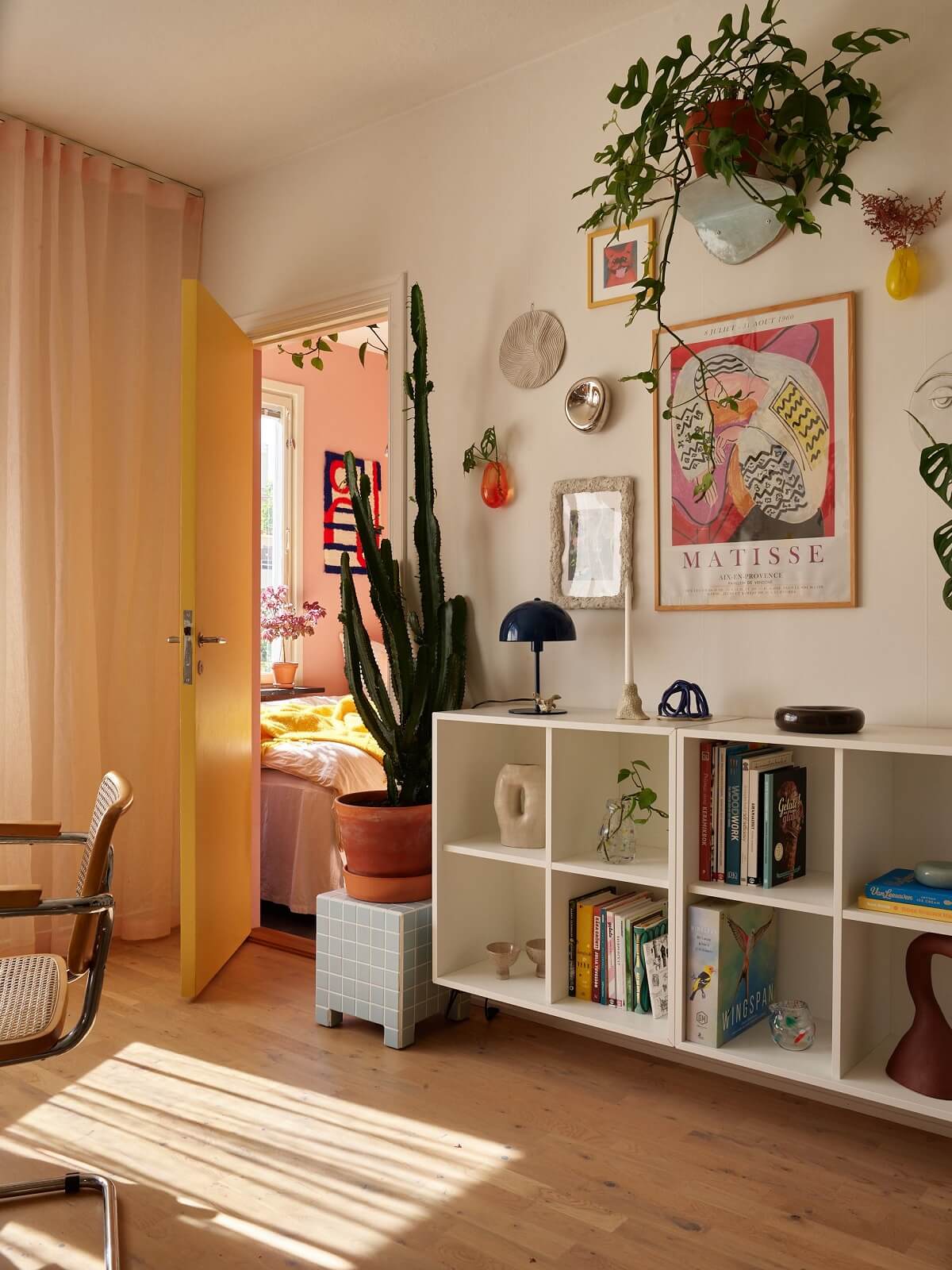 View of A Small Light Filled Apartment with Plants and Color - The Nordroom