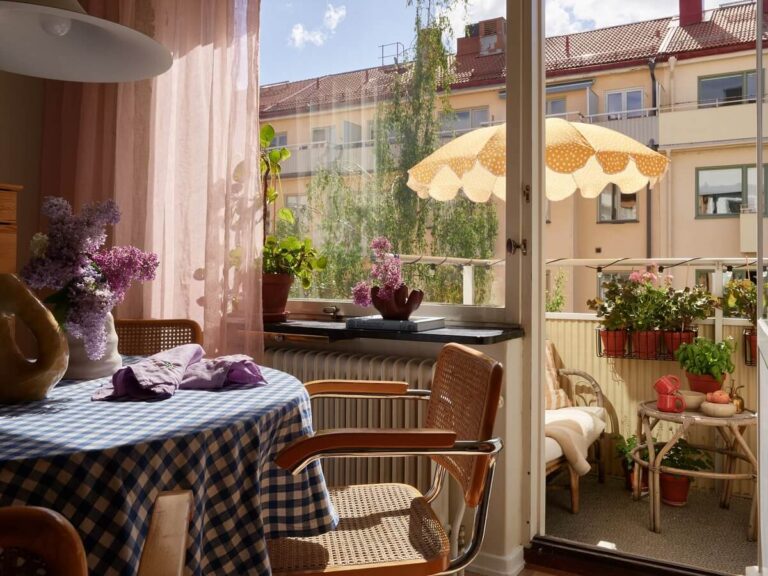 Image showcasing A Small Light Filled Apartment with Plants and Color - The Nordroom