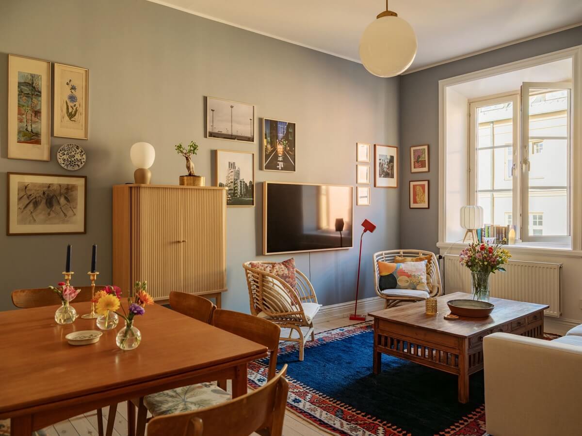 scandinavian living room with blue rug