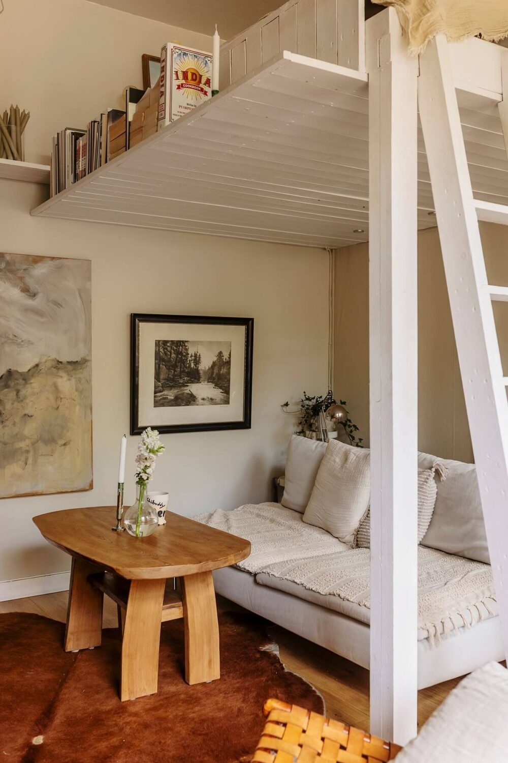 seating area studio apartment with loft bed