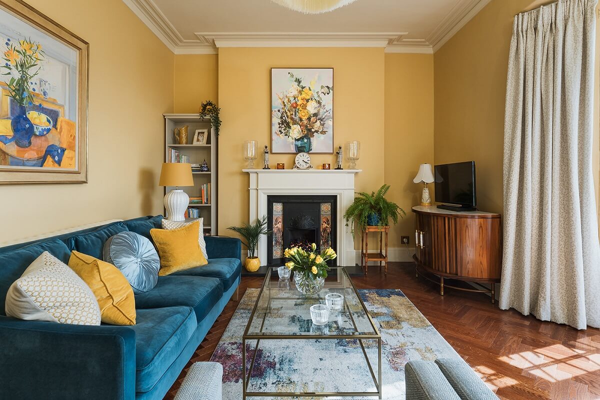 yellow living room with fireplace