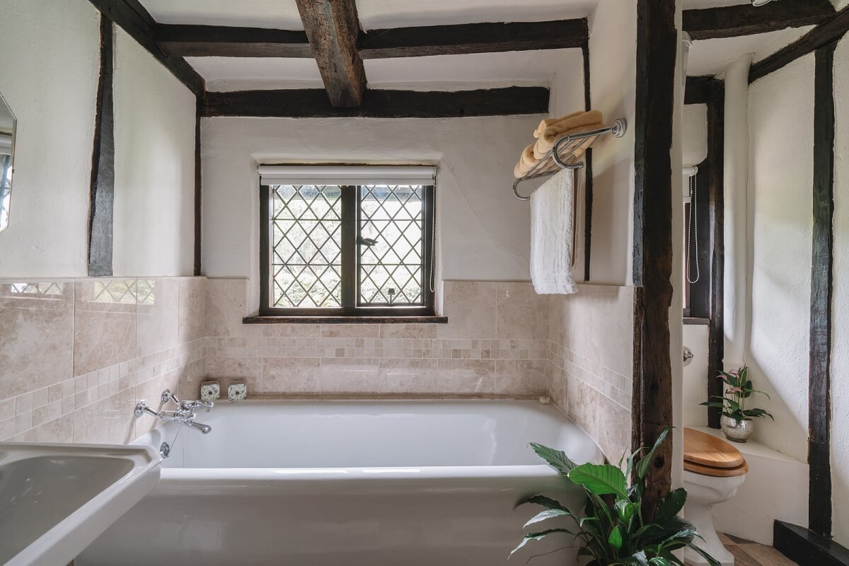 bathroom with exposed beams