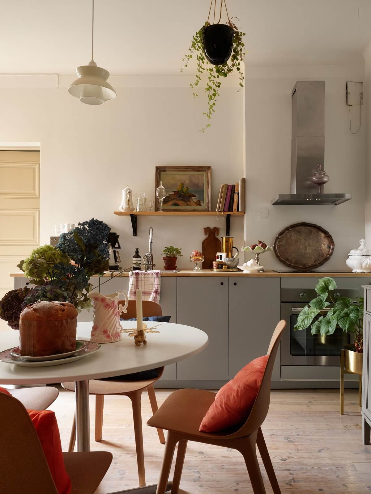 gray kitchen cabinets and round breakfast table nordroom