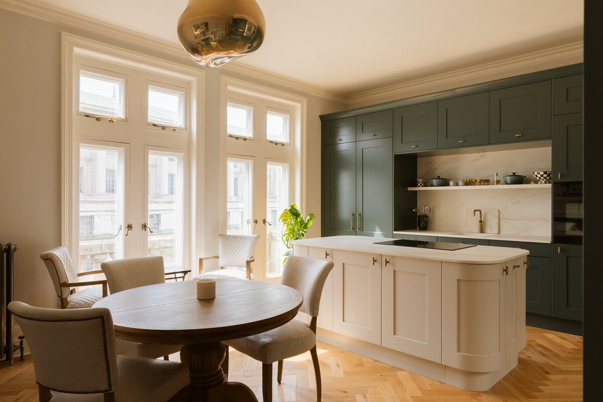 kitchen with island and green cabinets