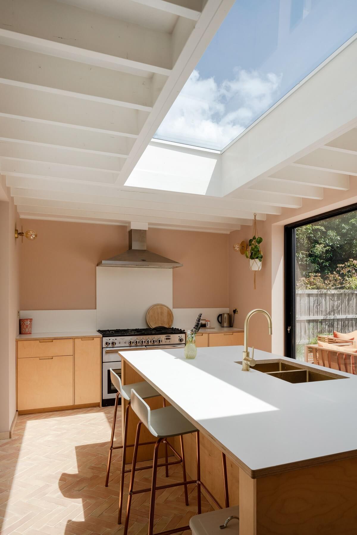 modern kitchen with skylight and pink walls nordroom