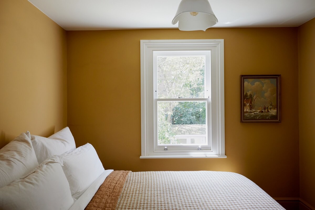 ochre yellow bedroom