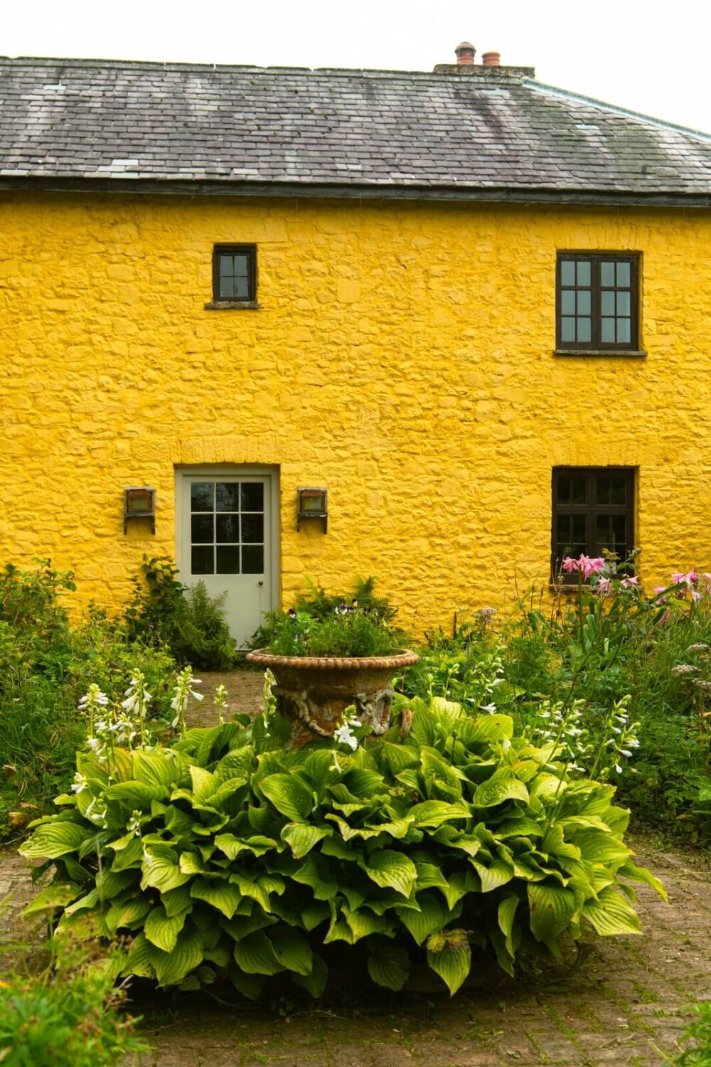 yellow farmhouse Dulux Colour of the Year 2025: True Joy