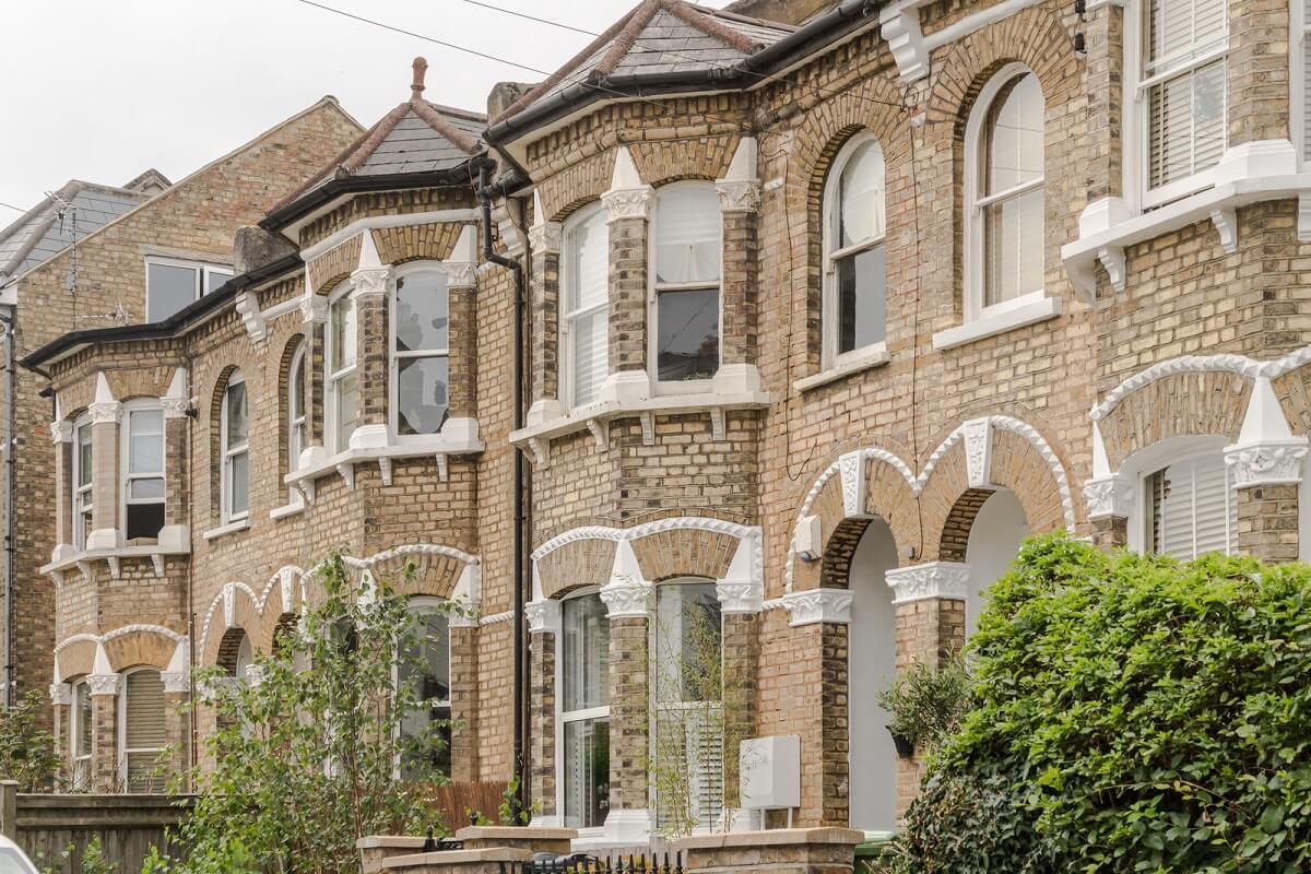 exterior facade victorian houses london nordroom A London Apartment with a Deep Olive Green Kitchen