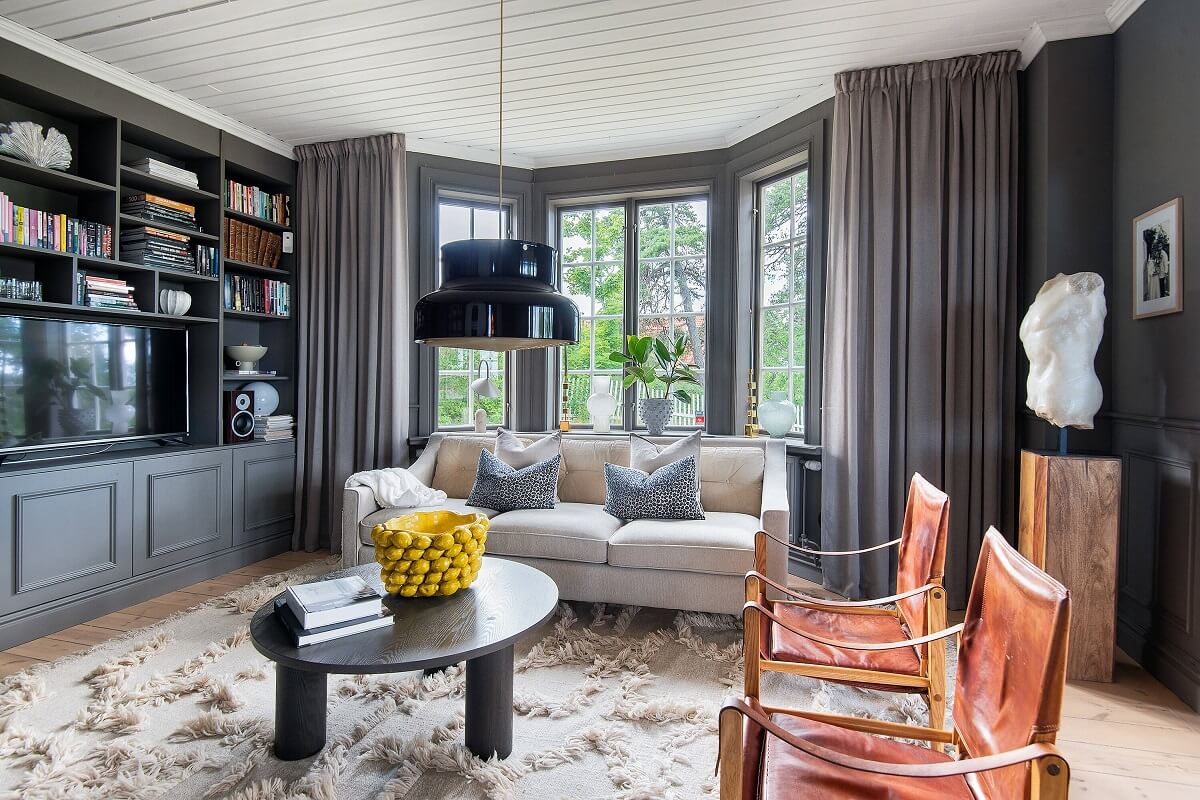gray living room with bay window