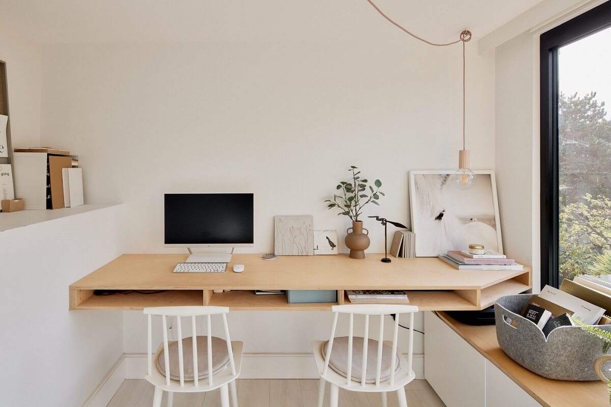 modern double wooden desk and window seat nordroom