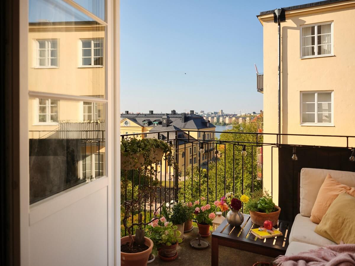 balcony with a view A Charming Small Two-Bedroom Apartment in Stockholm