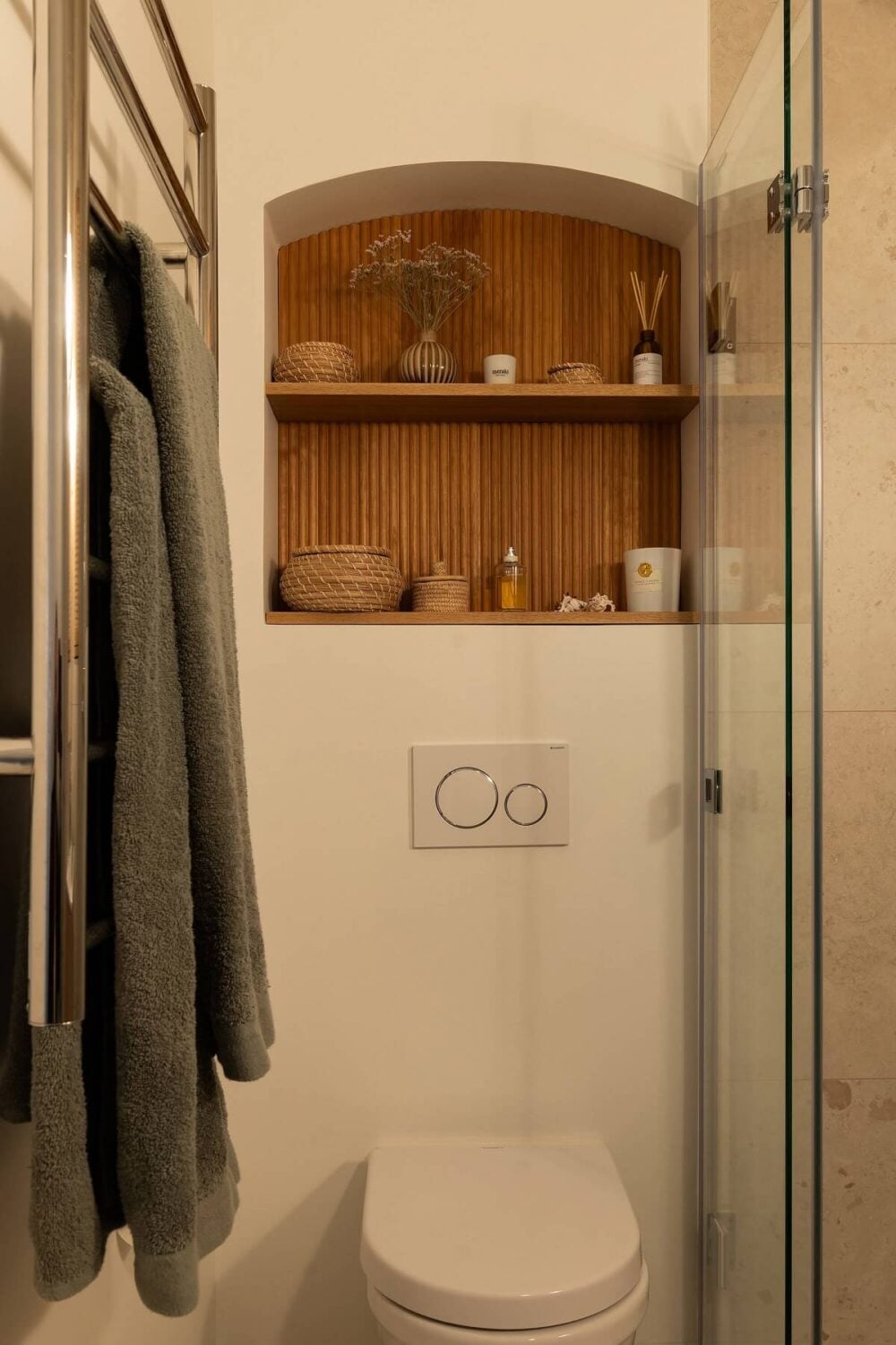 A Beautiful Turn-of-the-Century Apartment with Bold Color Accents 27 bathroom storage shelves above toilet