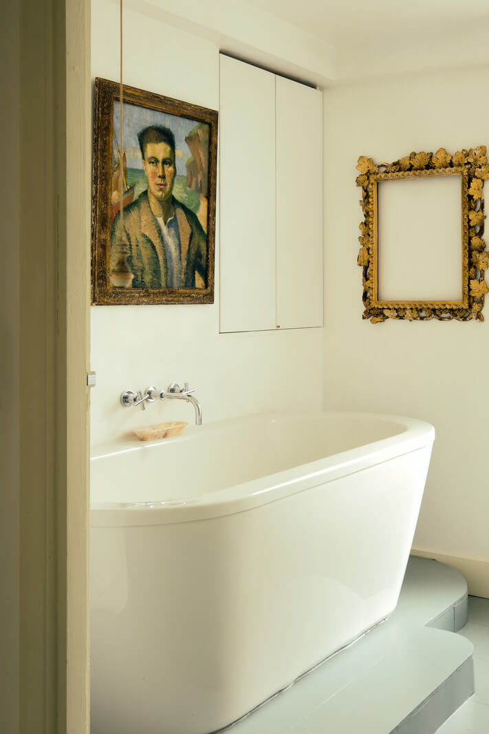 bathroom with freestanding bath