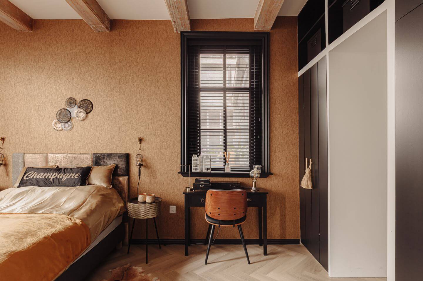 bedroom with wallpaper and desk
