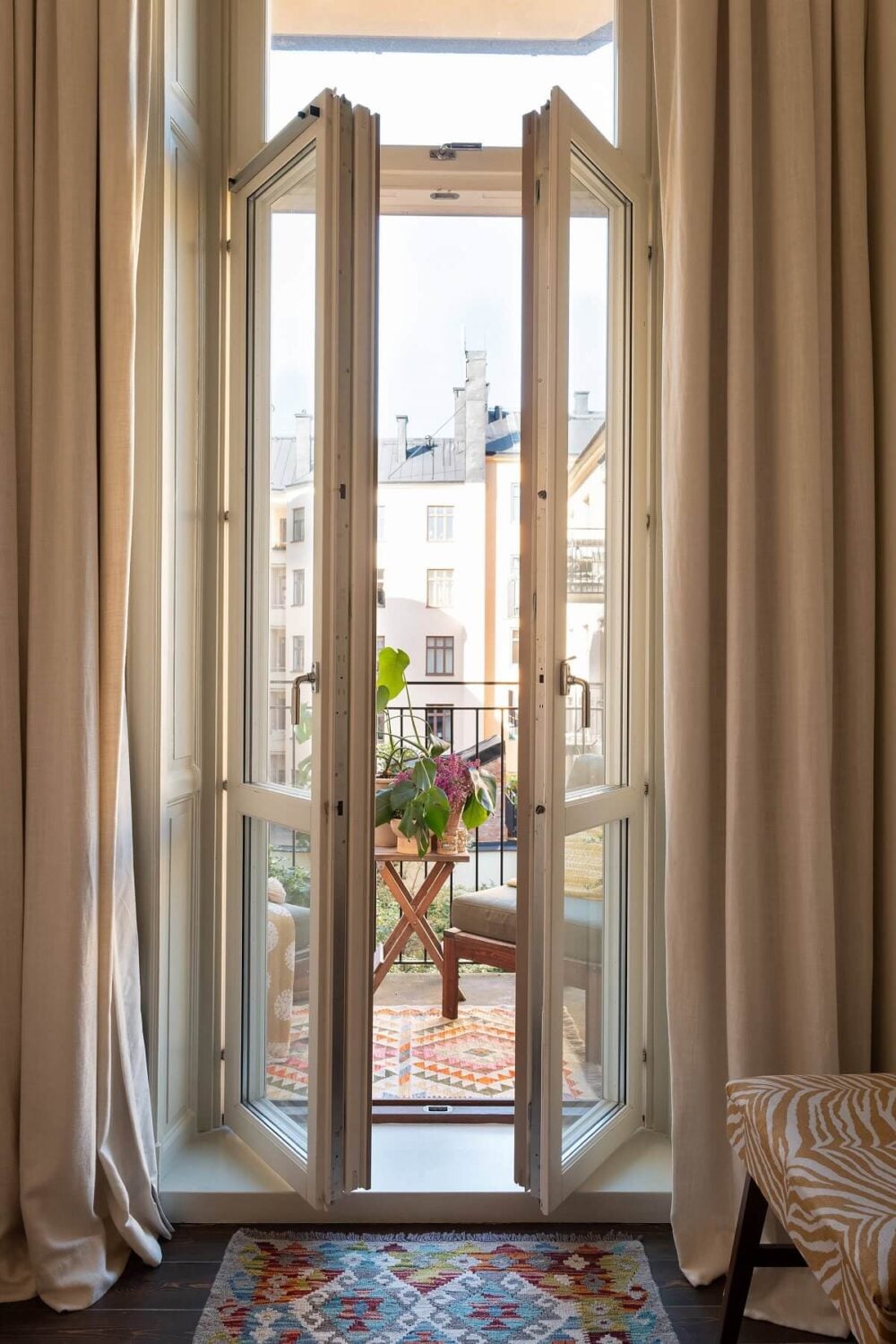 A Beautiful Turn-of-the-Century Apartment with Bold Color Accents 16 doors to balcony