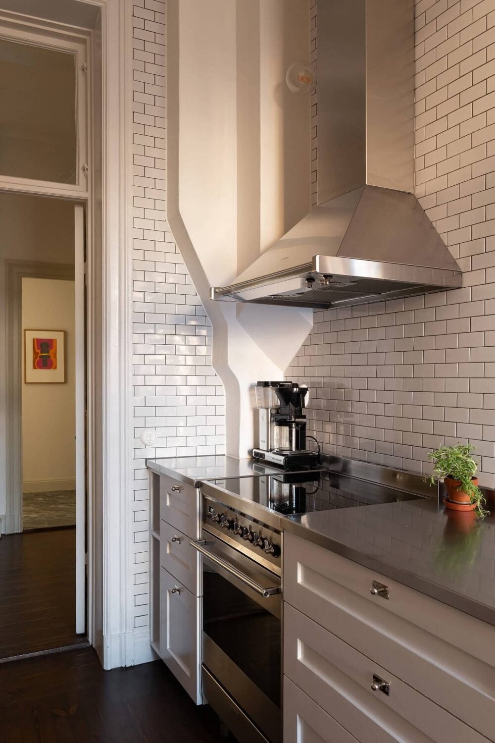 A Beautiful Turn-of-the-Century Apartment with Bold Color Accents 14 gray kitchen with white tiles