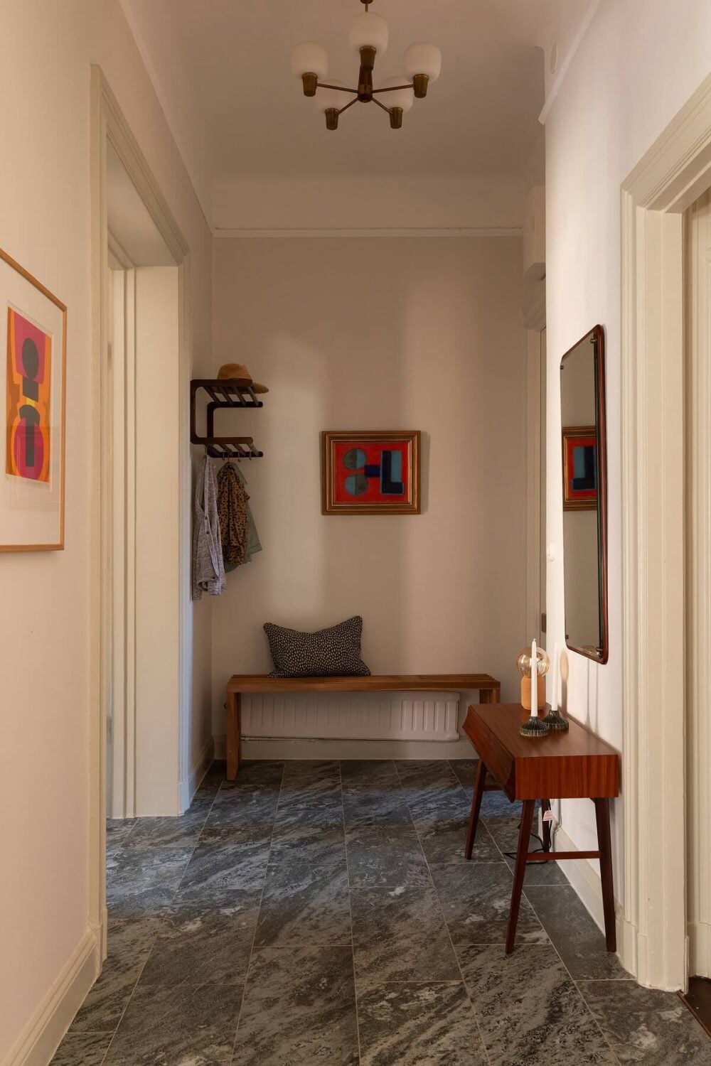 A Beautiful Turn-of-the-Century Apartment with Bold Color Accents 29 stone tiles hall