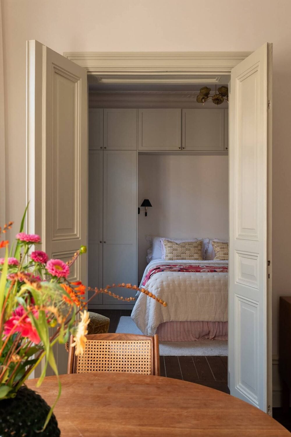 A Beautiful Turn-of-the-Century Apartment with Bold Color Accents 22 view into bedroom
