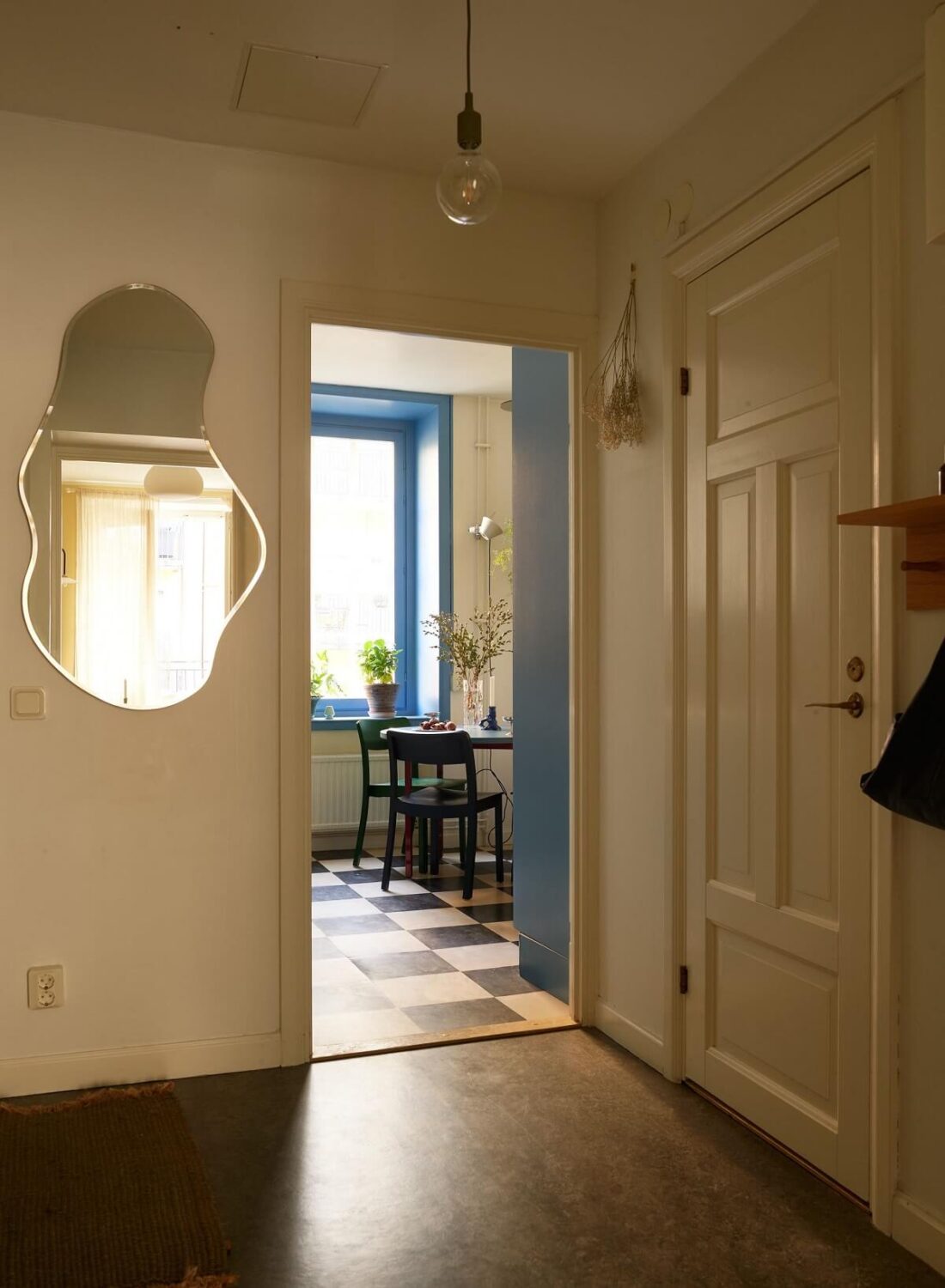 hall Golden Yellow Walls in a Colorful Swedish Studio Apartment