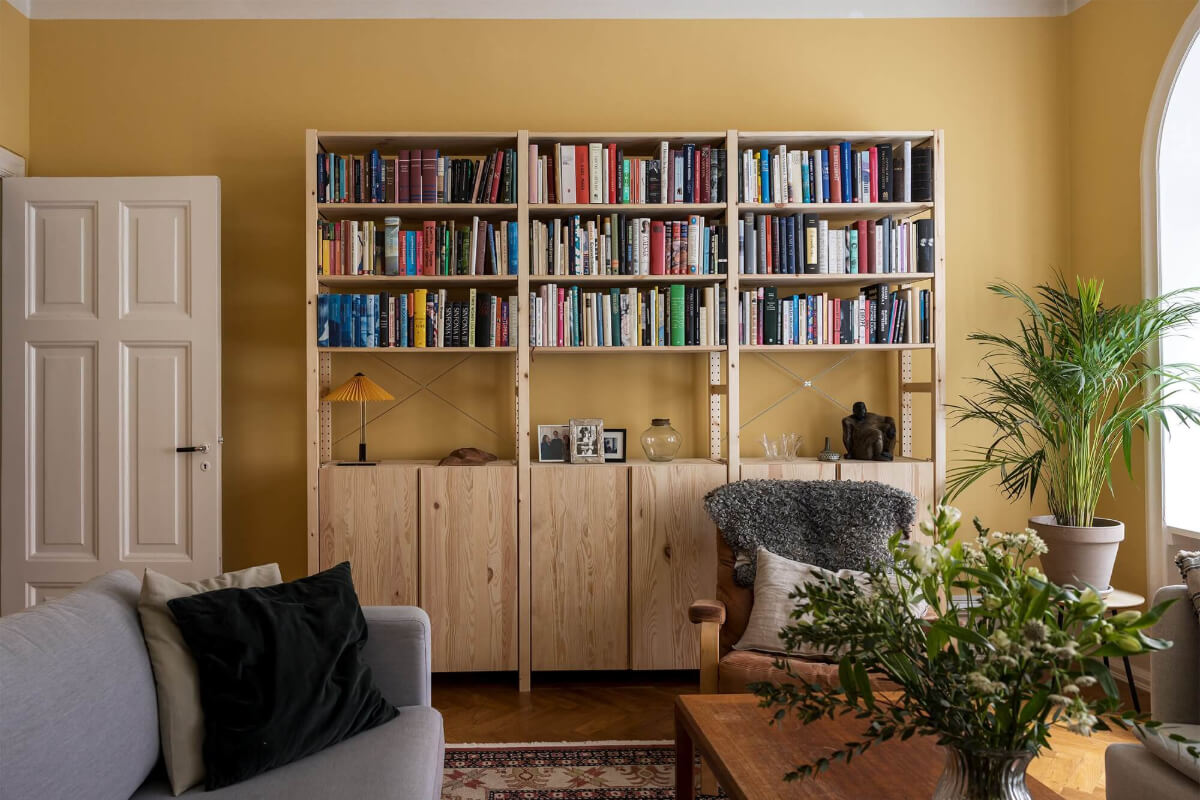 living room yellow walls ikea ivar cabinets with bookshelves and closed storage nordroom