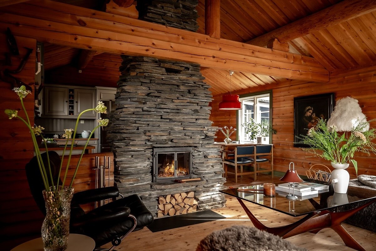 stone fireplace in wooden living room