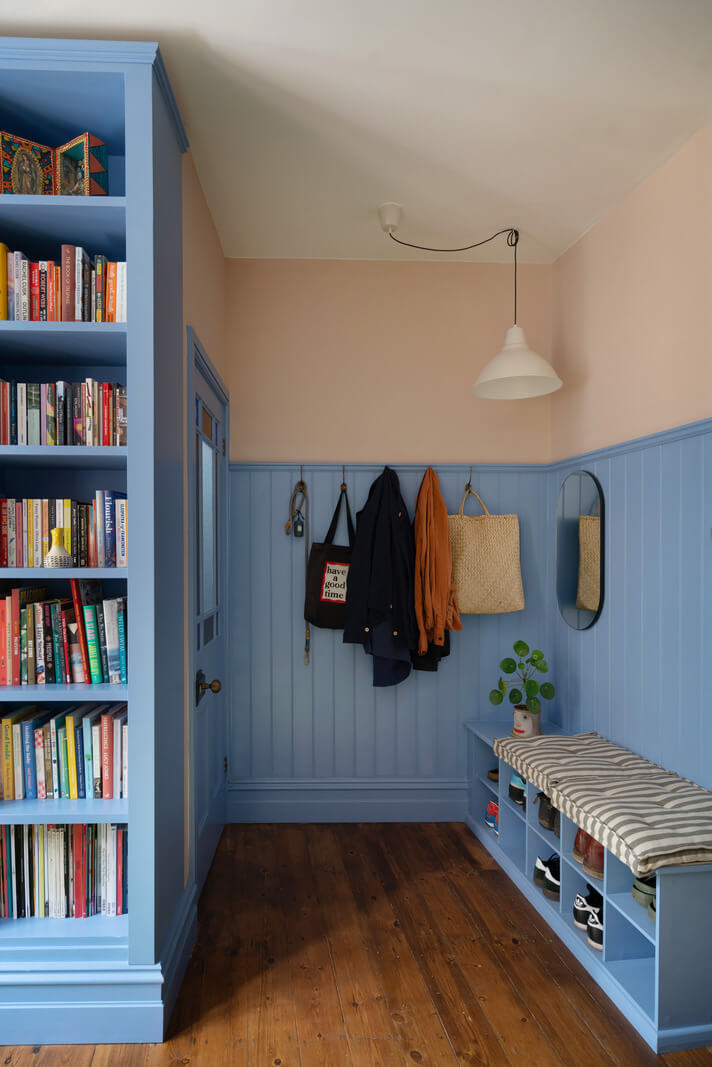 blue hall with storage bench