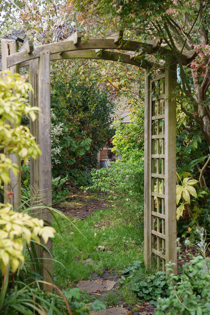 garden arch cottage england Colorful Furniture in a Historic English Cottage