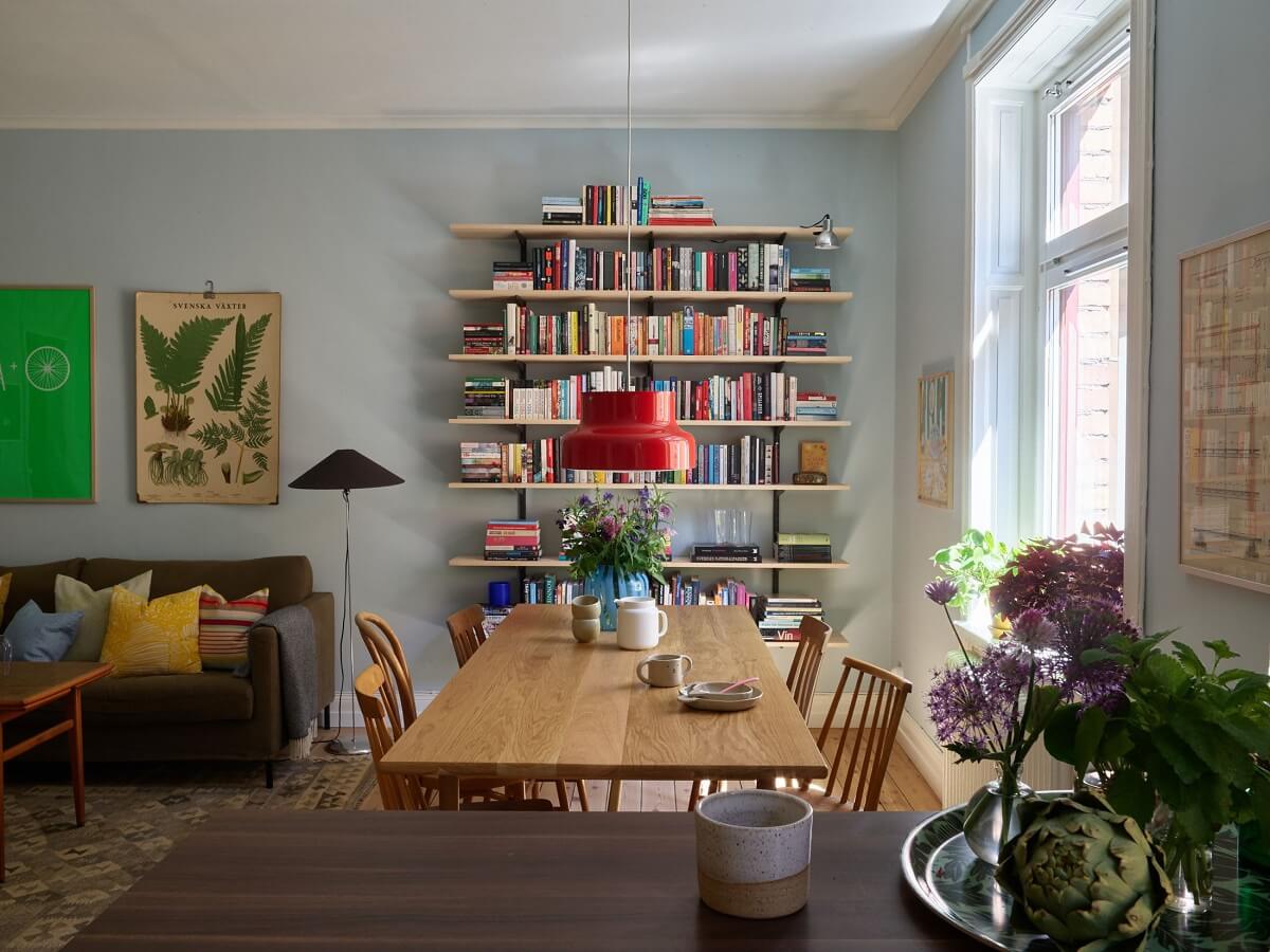 light blue living room bookshelves