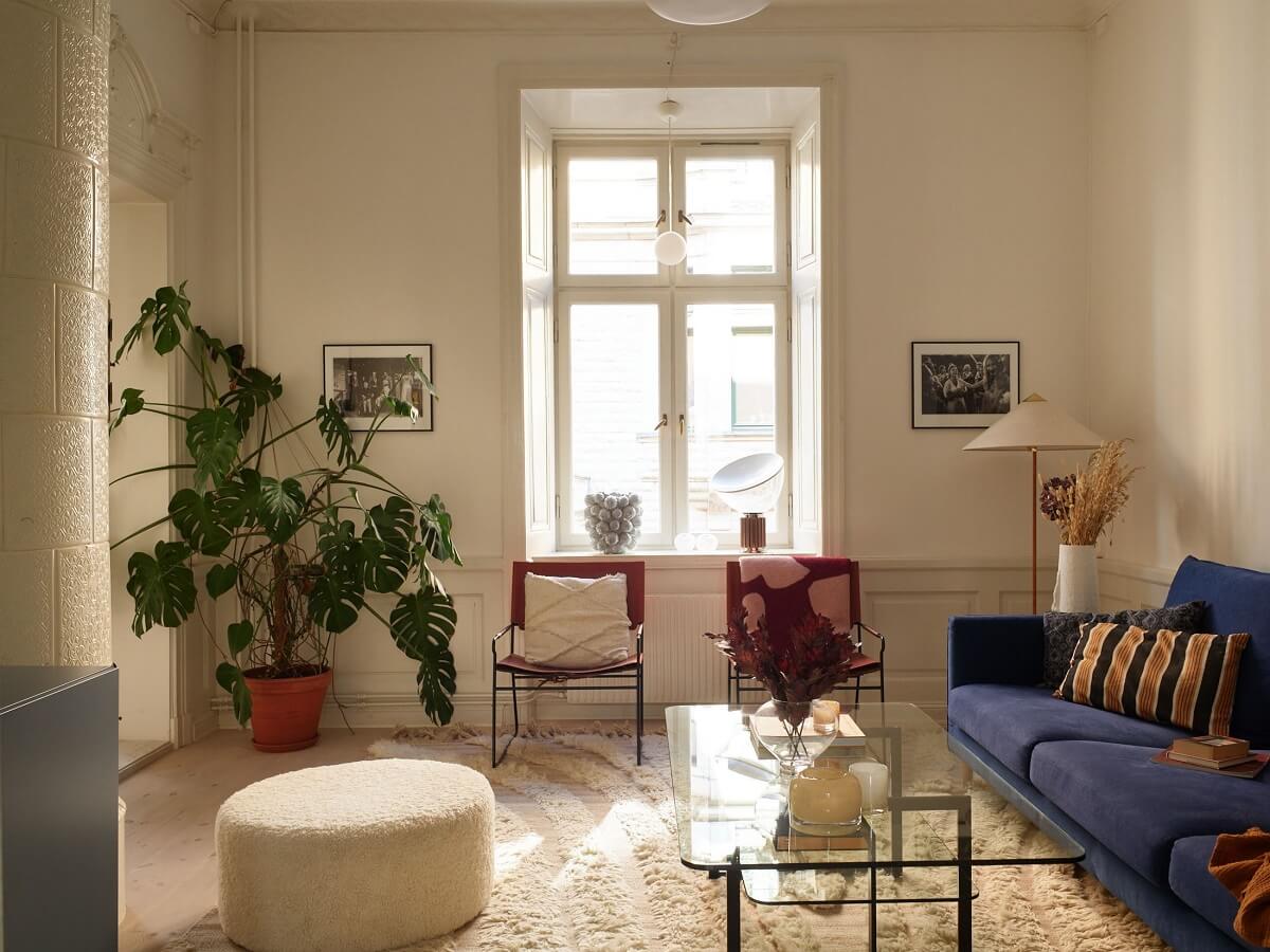 living room with blue sofa