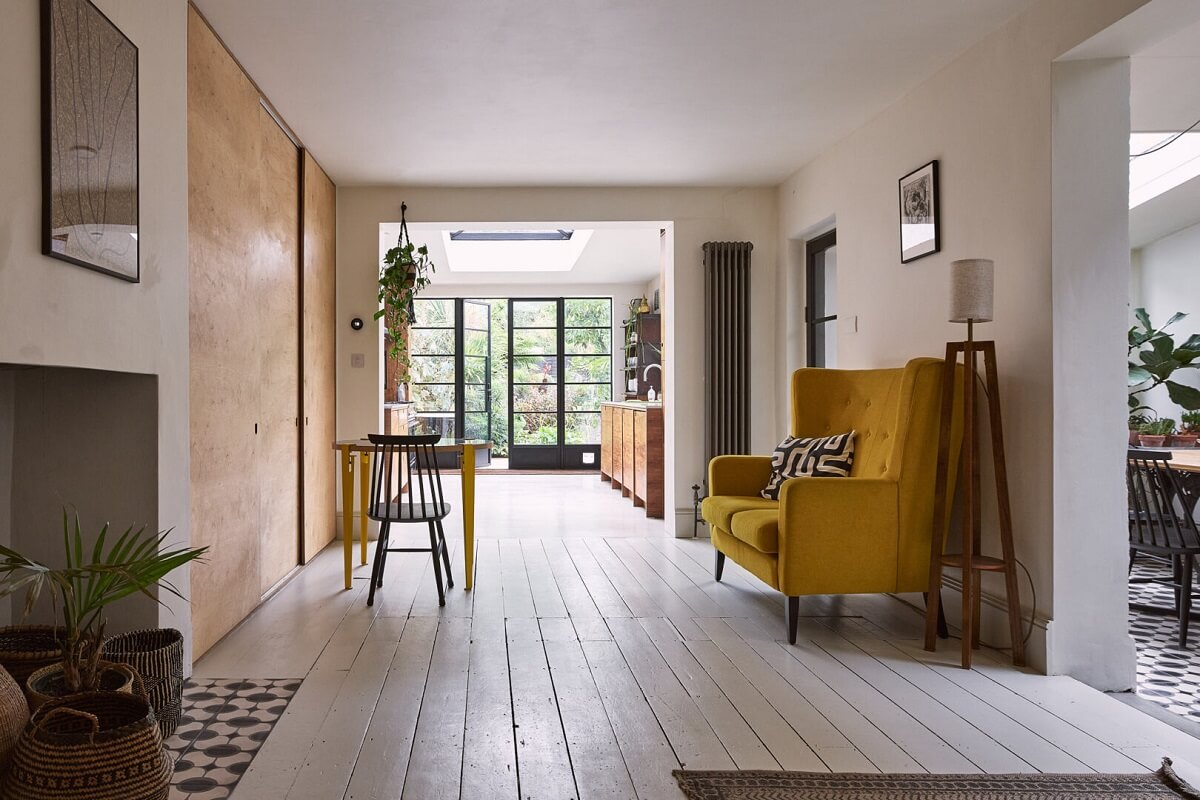 open plan sitting room yellow couch