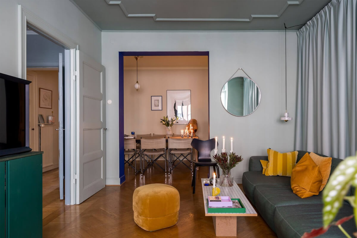 living room with kobalt blue doorway