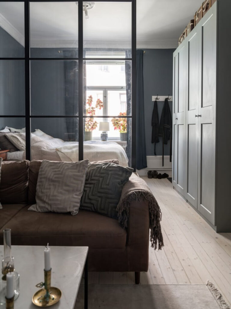 View of A Classic Studio Apartment with an Industrial Glass Room Divider - The ...