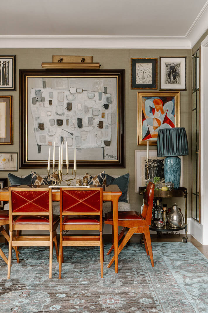 art filled apartment dining space