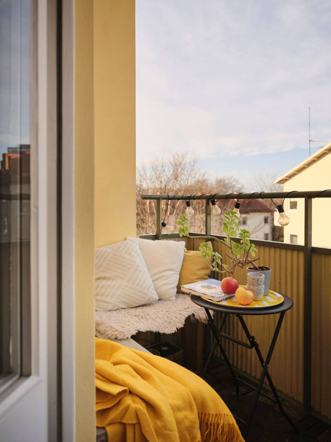 A Small, Light Swedish Apartment with Midcentury Features 9 balcony