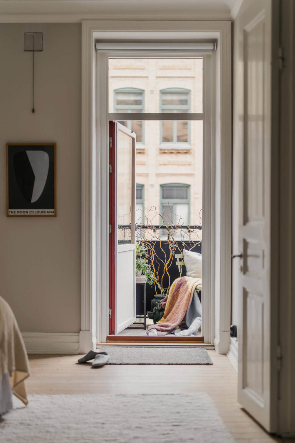 An Early 20th-Century Apartment with a Pink Kitchen 16 balcony door