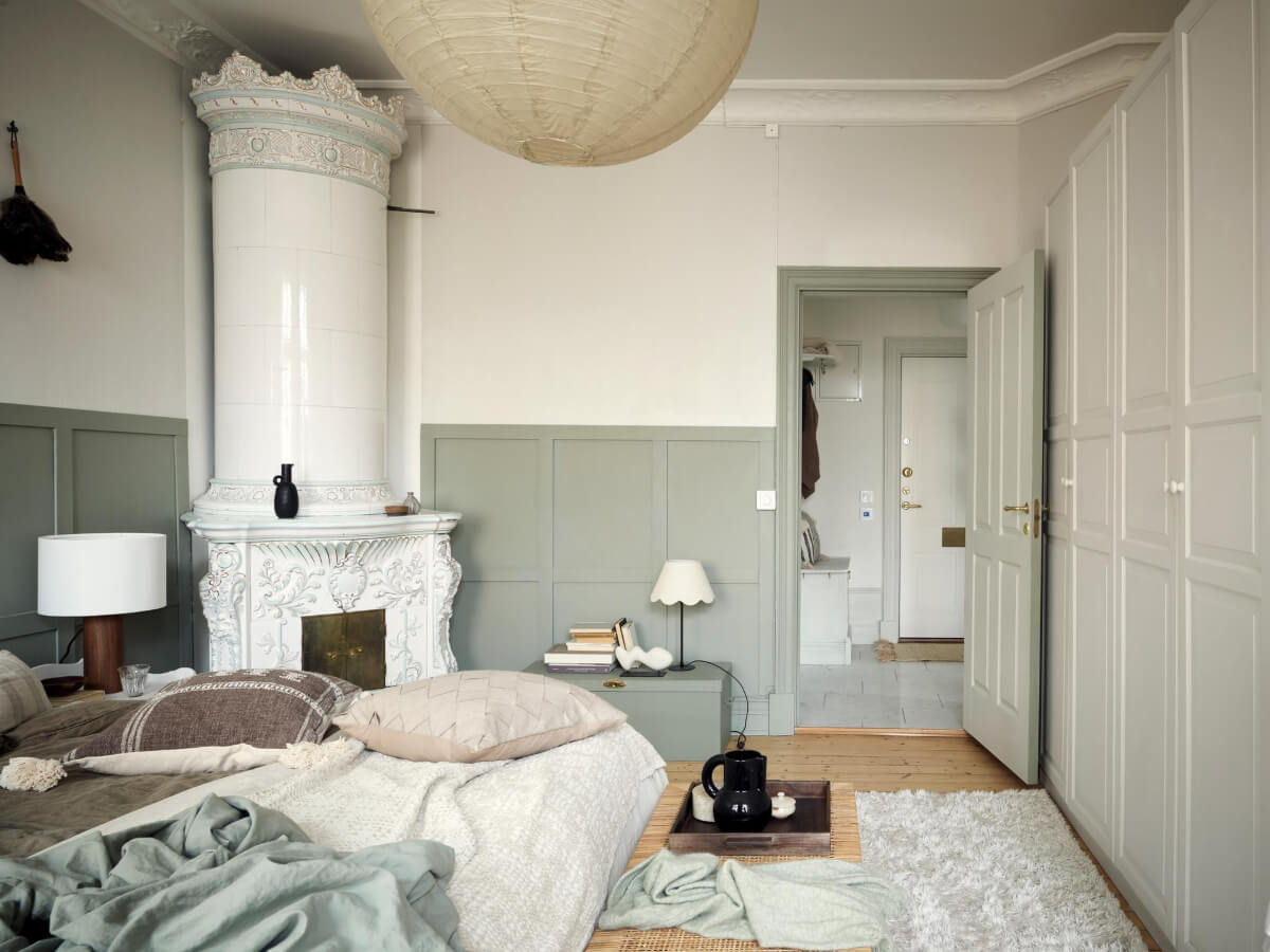 A Light Scandi Apartment in a Former Stately Home 20 bedroom gray-green wall paneling