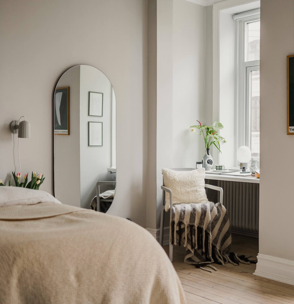 An Early 20th-Century Apartment with a Pink Kitchen 13 bedroom large mirror desk under window