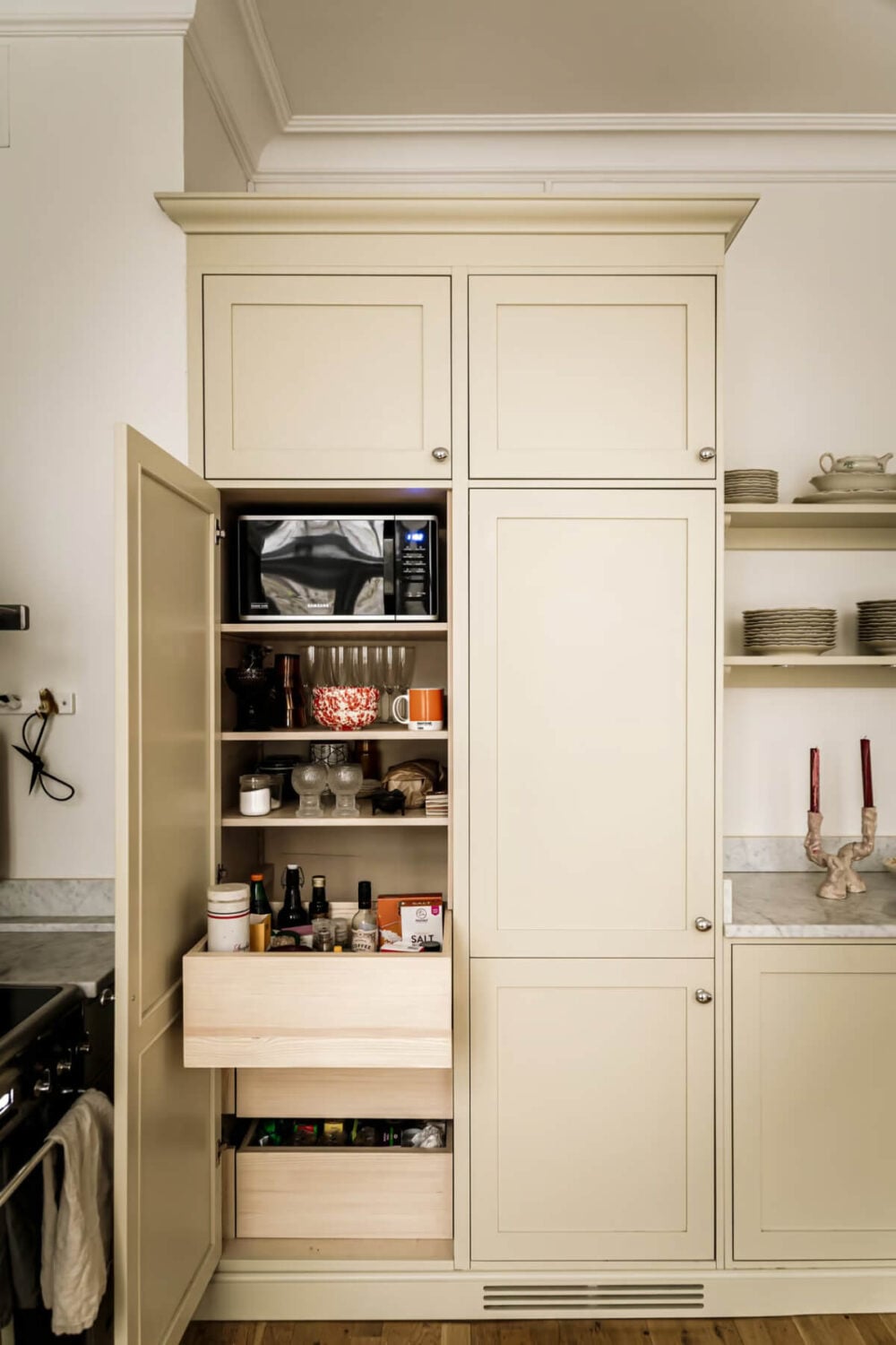 Large Rooms in an Art Nouveau Apartment in Sweden 10 butter yellow kitchen cabinets