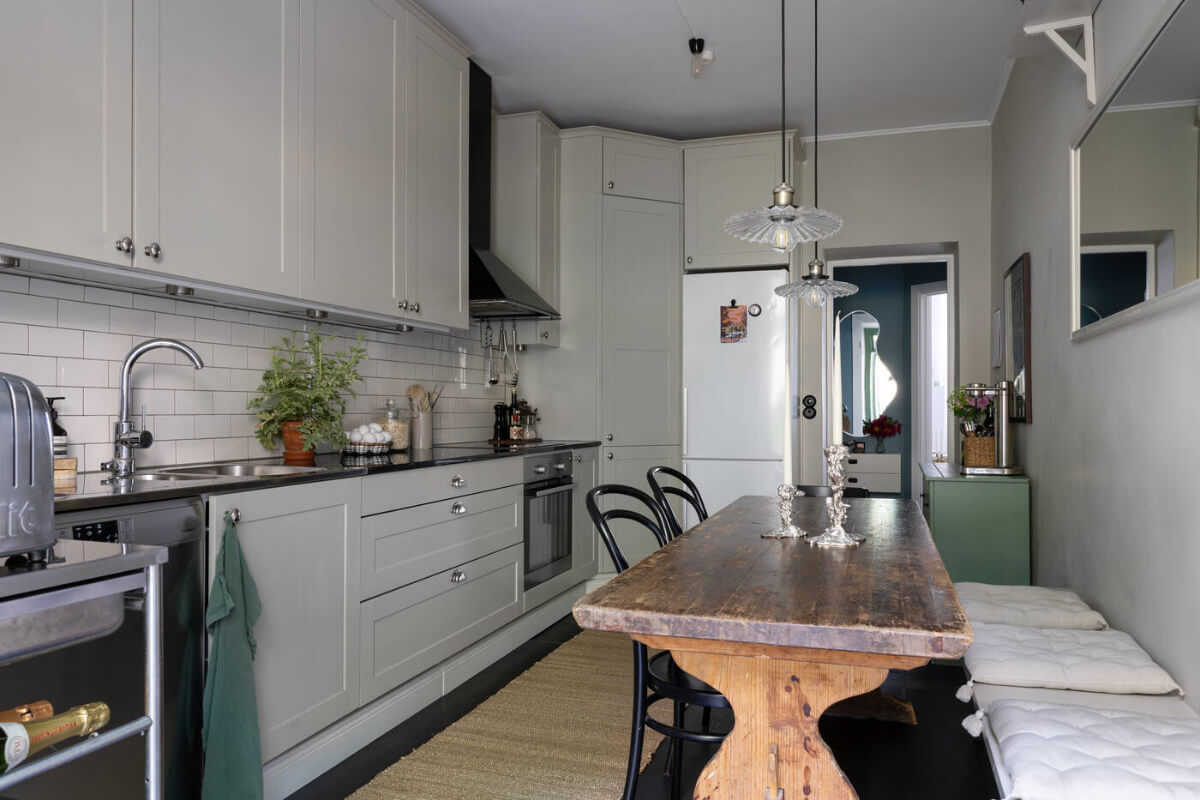 classic light gray kitchen cabinets rustic dining table