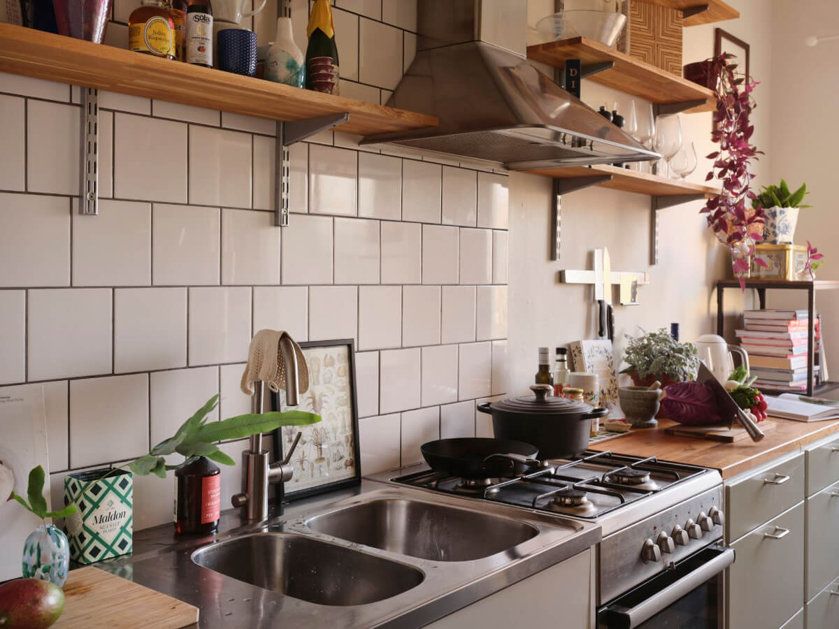 A Small, Light Swedish Apartment with Midcentury Features 13 cozy kitchen with shelves