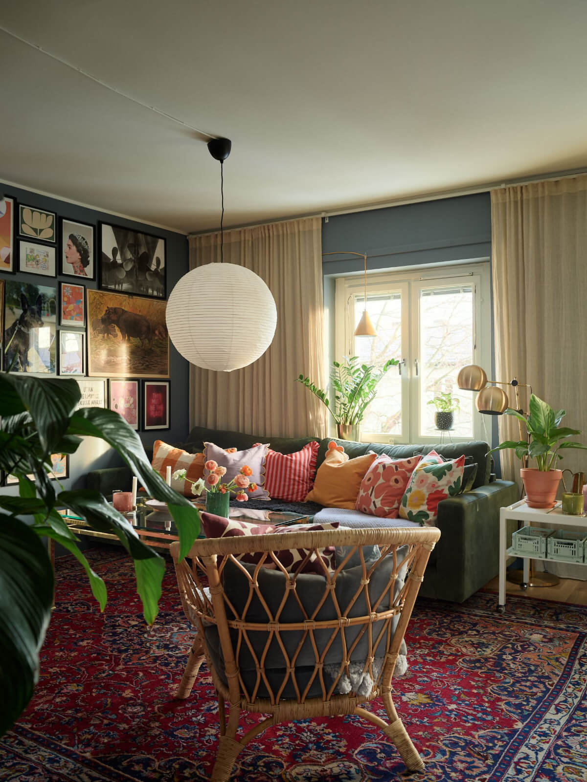 cozy living room gallery wall persian rug cushions