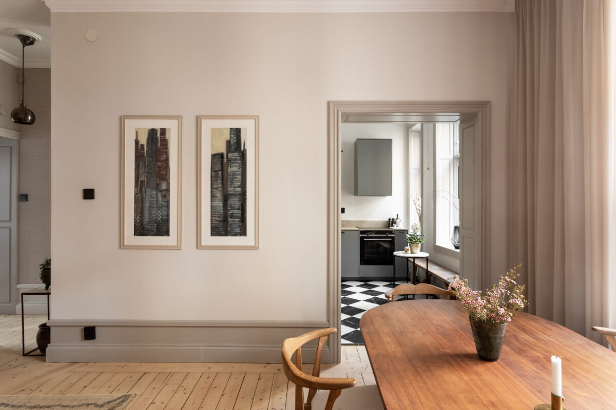 gray woodwork living room view into kitchen