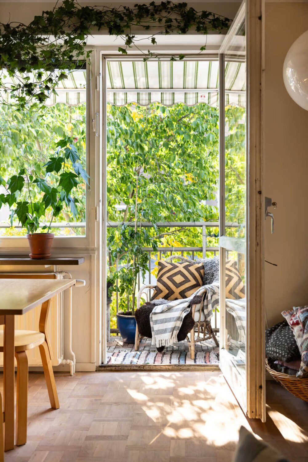 A Cozy Swedish Apartment in a 1950s Building 6 green balcony