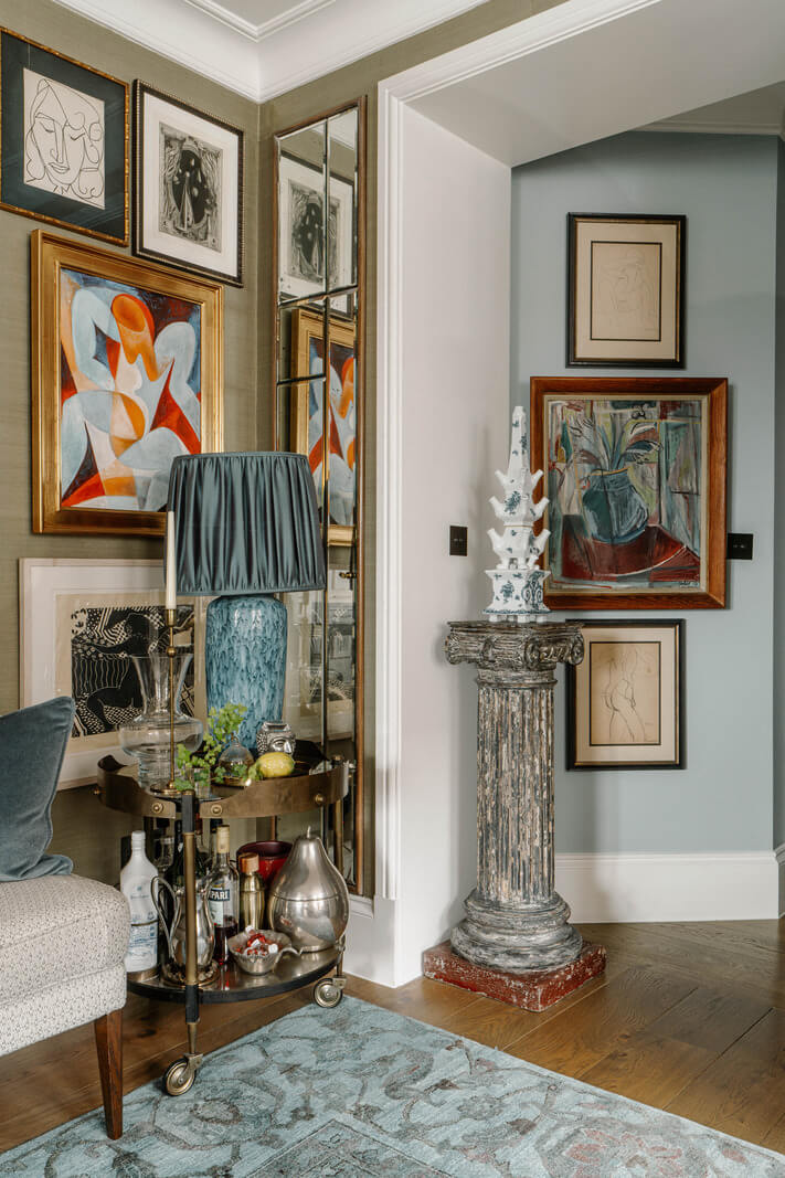 hall space with art A Cozy Art-Filled Attic Apartment in London