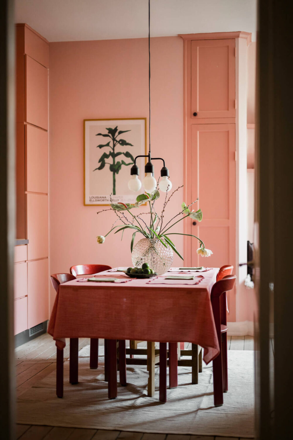 An Early 20th-Century Apartment with a Pink Kitchen 26 large dining table pink kitchen