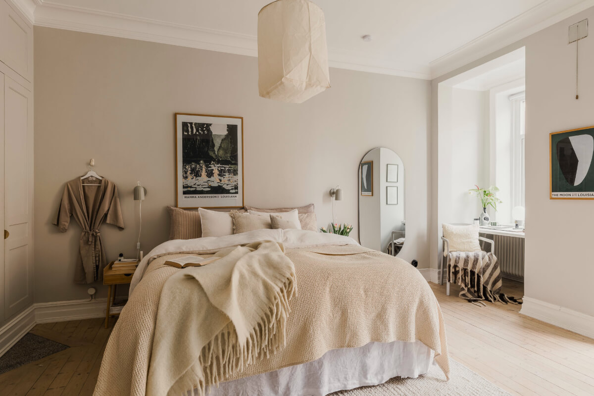 An Early 20th-Century Apartment with a Pink Kitchen 10 light bedroom home office in niche under window