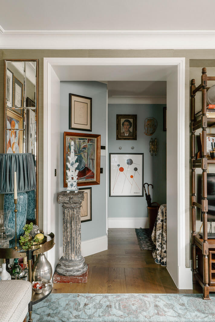 light blue hall with art